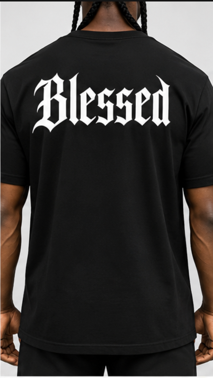 Blessed Tee in black, back view with large white Blessed wordmark